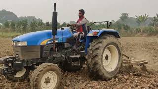 New Holland TT55 Tractor on Cultivation [upl. by Oniliuqnart]