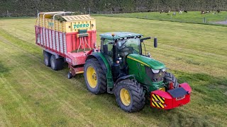 John Deere 6175R Loading amp Carting Grass Silage [upl. by Aneetak]