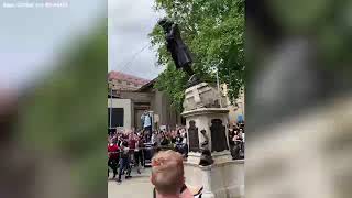 Edward Colston statue British protesters dismount statue of slave trader toss it in harbor  ABC7 [upl. by Markson]