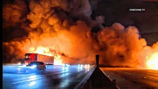 Massive Fire Engulfs Pallet Yard and 10 Freeway in Los Angeles [upl. by Amehr129]