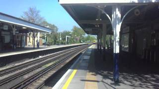 London Overground trains and D78 Stock District Line trains arriving and departing Kew Gardens [upl. by Nerin]