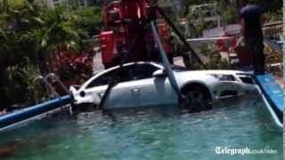 CCTV captures car crashing into swimming pool [upl. by Timus501]