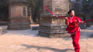 Three Section Staff Woman Shaolin Temple 2012 [upl. by Annaitsirhc]