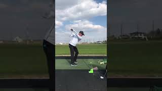 Plane Set golf training aid by JS Elements  Man hitting a ball on the range [upl. by Bores713]