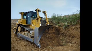 CAT D6T Pushing topsoil [upl. by Nageem]