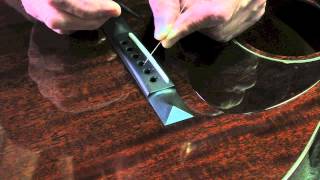 How to set Bridge Pins on an Acoustic Guitar [upl. by Camala209]