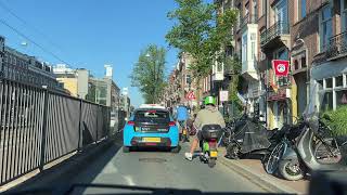 A sunny summer morning commute with the cyclists in Amsterdam I am turning onto the Overtoom [upl. by Ahseyk]