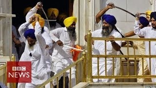 Sikh groups clash with swords at Indias Golden Temple  BBC News [upl. by Llevrac]