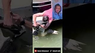 Pelican gets a fish stuck in his throat and a man rescues him Must see it now sealife seafood [upl. by Arola]