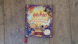 The Harry Potter Wizarding Almanac 2023 JK Rowling Review Flip Through [upl. by Elleyoj]