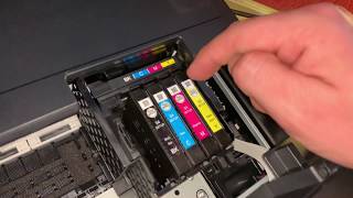 How to replace Epson WorkForce printer ink cartridge change cartridges Epson multifunction device [upl. by Htrag]