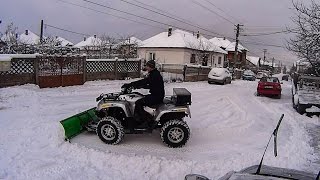 Snow Plowing with the Homemade ATV Snow Plow [upl. by Enetsirk]