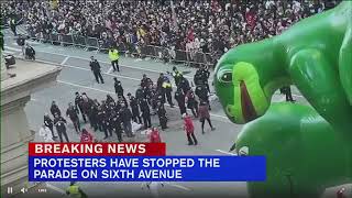 ProPalestinian protesters appear to glue hands to street during NYC Macys Thanksgiving Day Parade [upl. by Aidnac223]