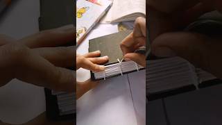 binding a small sketchbook 🪡🧵bookbinding bookbinder easy bookbinding trandingshorts viralsong [upl. by Rambert]