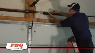 Broken Garage Door Spring Garage Door Spring Replacement PDQ Doors Cincinnati Ohio [upl. by Mehsah475]