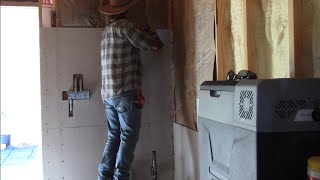 Installing Hardiebacker behind the wood burning stove area Timeline Ranch west Texas homestead [upl. by Finzer821]