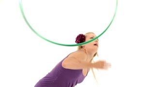 How to Do a Hula Hoop Tuck Toss  Hula Hooping [upl. by Ecirtnas774]