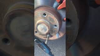 Removing snapped bolt from rear wheel  automobile [upl. by Niret]