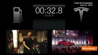 Elon Musk Demos Tesla Beating Audi in Refueling Contest [upl. by Schnurr663]