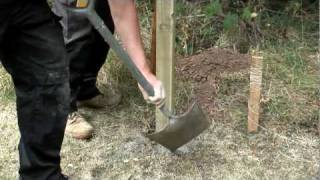 How to install a fence post into soil [upl. by Eatnahs]