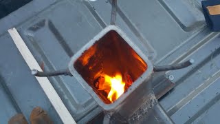 Lighting the 30minute rocket stove for the first time  Redneck Homestead [upl. by Jarus]