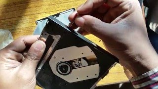 Disassemble Dell desktop dvd rom drive [upl. by Atnoid]