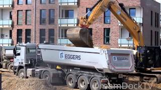 CATERPILLAR 320E EXCAVATOR DIGGING SAND ON CONSTRUCTION SITE amp LOADING TRUCKS [upl. by Ellinej]