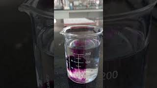 Diffusion of potassium permanganate crystals in water  Chemistrydemo [upl. by Dranreb415]