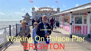 Walking on palace pier of Brighton England [upl. by Anyrak179]