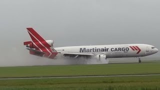 CROSSWIND landing lot of SPRAY MD11 AMS EHAM PHMCW martinair cargo [upl. by Selrhc]