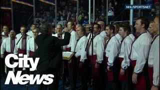 Ukrainian choir honours home by singing Ukrainian anthem at Jets game [upl. by Thibaut]