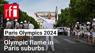 Olympic flame arrives in Paris suburb of Pantin • RFI English [upl. by Anwahsak108]