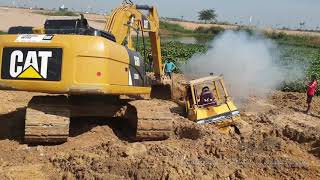 Bulldozer stuck in deep mud amp recovery by Excavator [upl. by Yenetruoc915]