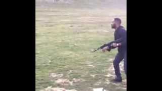 UFC Champion Jon Jones shooting a machine gun [upl. by Beauregard175]