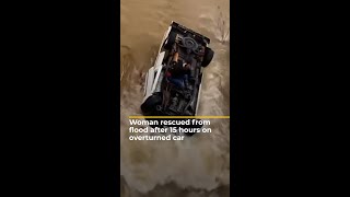 Woman rescued from flood after 15 hours on overturned car [upl. by Kasey95]