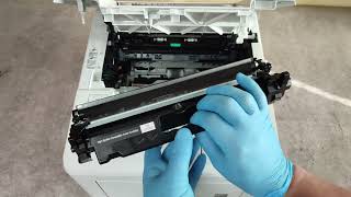 HOW TO REPLACE THE TONER CARTRIDGE AND THE DRUM UNIT ON HP LASERJET PRO M118 M119 M203 M205 M206 [upl. by Ralyks631]