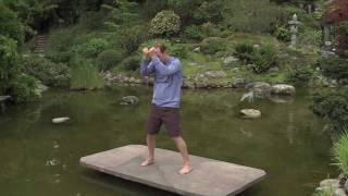 OneMinute Qi Gong  Golf Stretching [upl. by Aicirpac506]