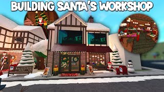 BUILDING SANTAS WORKSHOP AND GIFT WRAPPING IN MY NEW BLOXBURG CHRISTMAS TOWN [upl. by Ekusoyr]