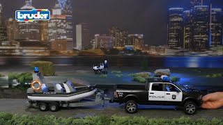 Bruder 02507 Police Ram 2500 w Trailer Boat and 2 Figures [upl. by Essiralc]