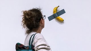 Ducttaped banana art up for auction in New York [upl. by Sgninnej]