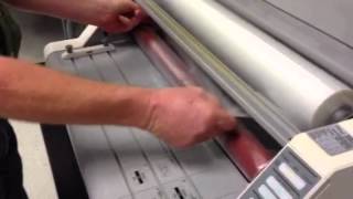 Loading film on GBC Laminator [upl. by Harman310]