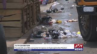 Filth Exhibition Foodstuffs and filth compete for space at Agbogbloshie Market [upl. by Attelra]