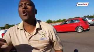 WATCH Gauteng cop shoves motorist during roadside altercation [upl. by Terrej]