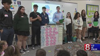 Newington high school students teach elementary schoolers finance [upl. by Damas]