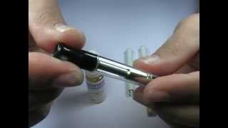 Comment remplir un clearomiseur Vega de cigarette électronique KR808 [upl. by Lindblad]