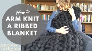 How to Arm Knit a Ribbed Blanket with Giant Yarn [upl. by Bast]