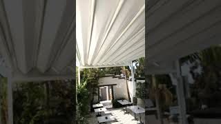 Retractable Fabric Pergola In Operation  Outdoor Cafe [upl. by Valdes]