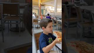 His First Taste of Sbarro Pizza [upl. by Aihsekyw109]