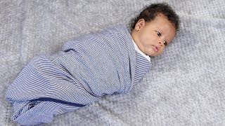 How to Swaddle a Baby Using a Blanket [upl. by Combe667]