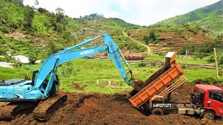 Excavator Trucks Loading Moving Mud Kobelco SK200 Isuzu NMR71HD [upl. by Rufus]